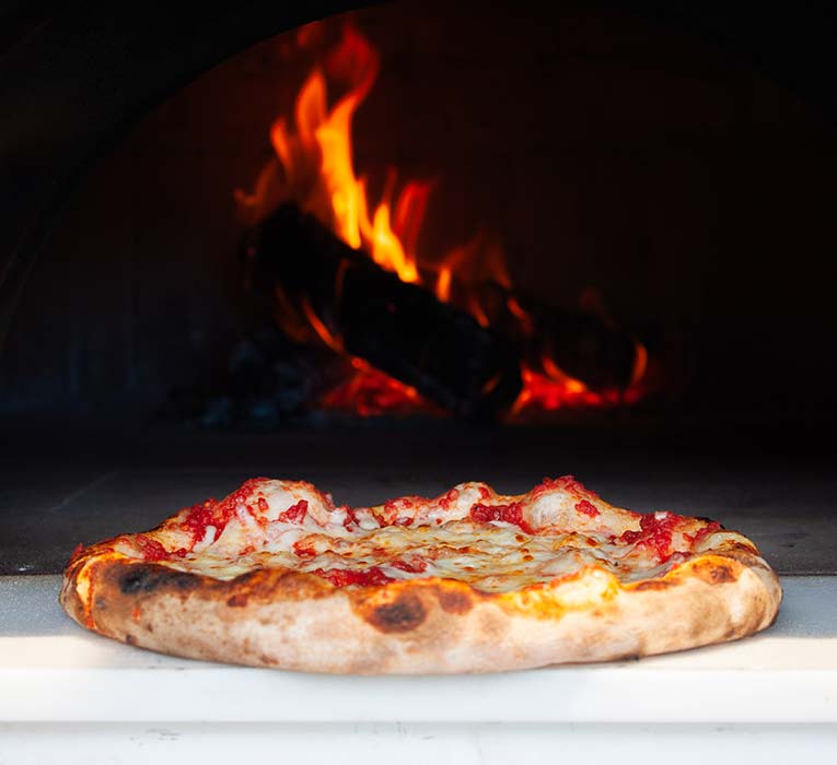 Pizzas Fresh From The Wood-Fired Oven
